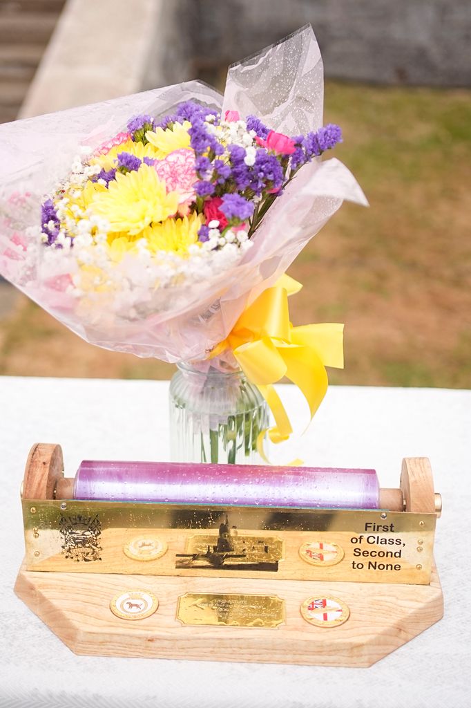 The cling film roll holder that was presented to Queen Camilla during a garden party for the HMS Astute Ship's Company 