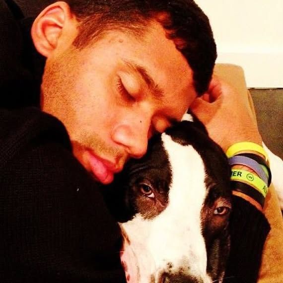 russell wilson hugging dog prince