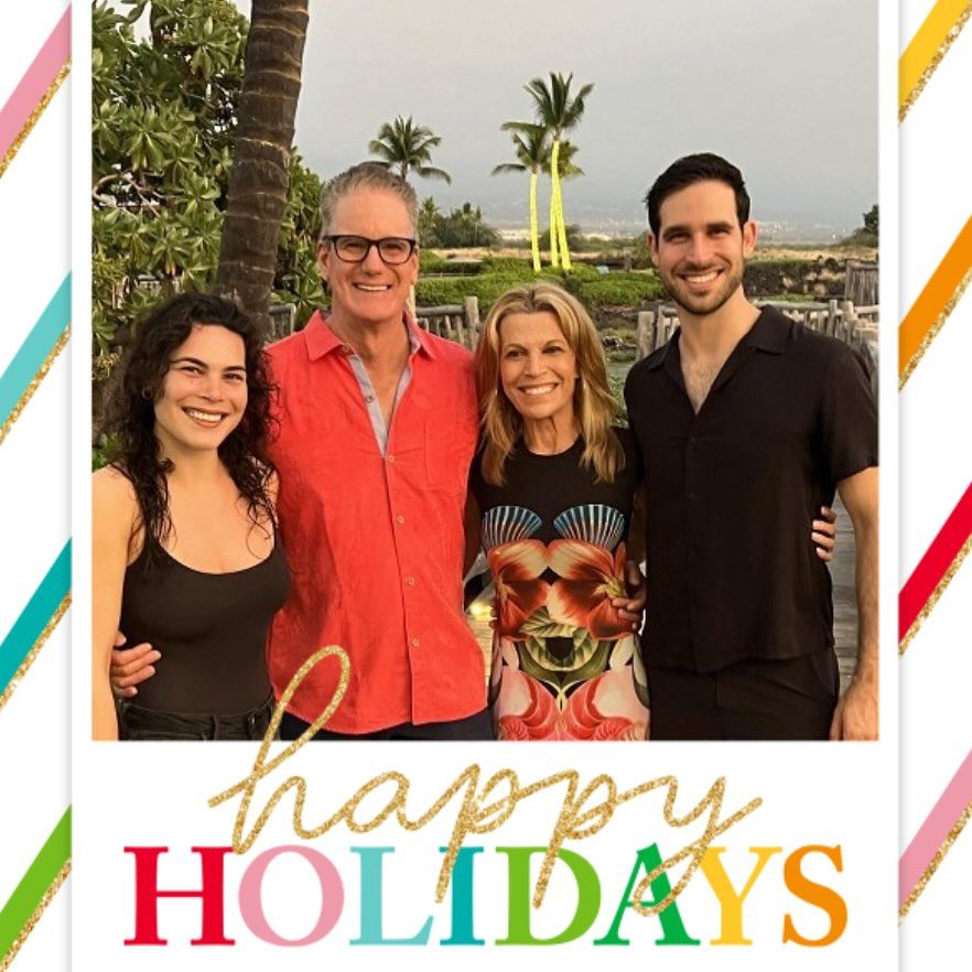 Vanna, John, and her two children celebrating the holidays