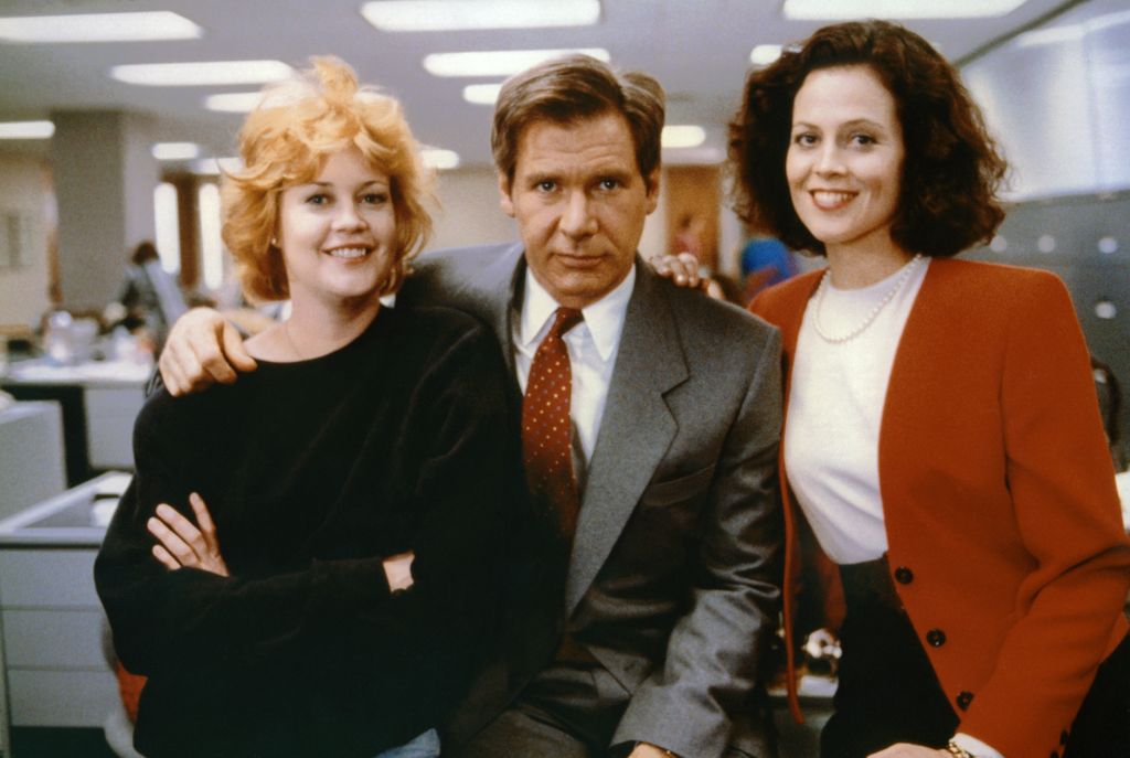 Melanie Griffith, Harrison Ford and Sigourney Weaver on the set of Working girl directed by German-born American Mike Nichols, 1988