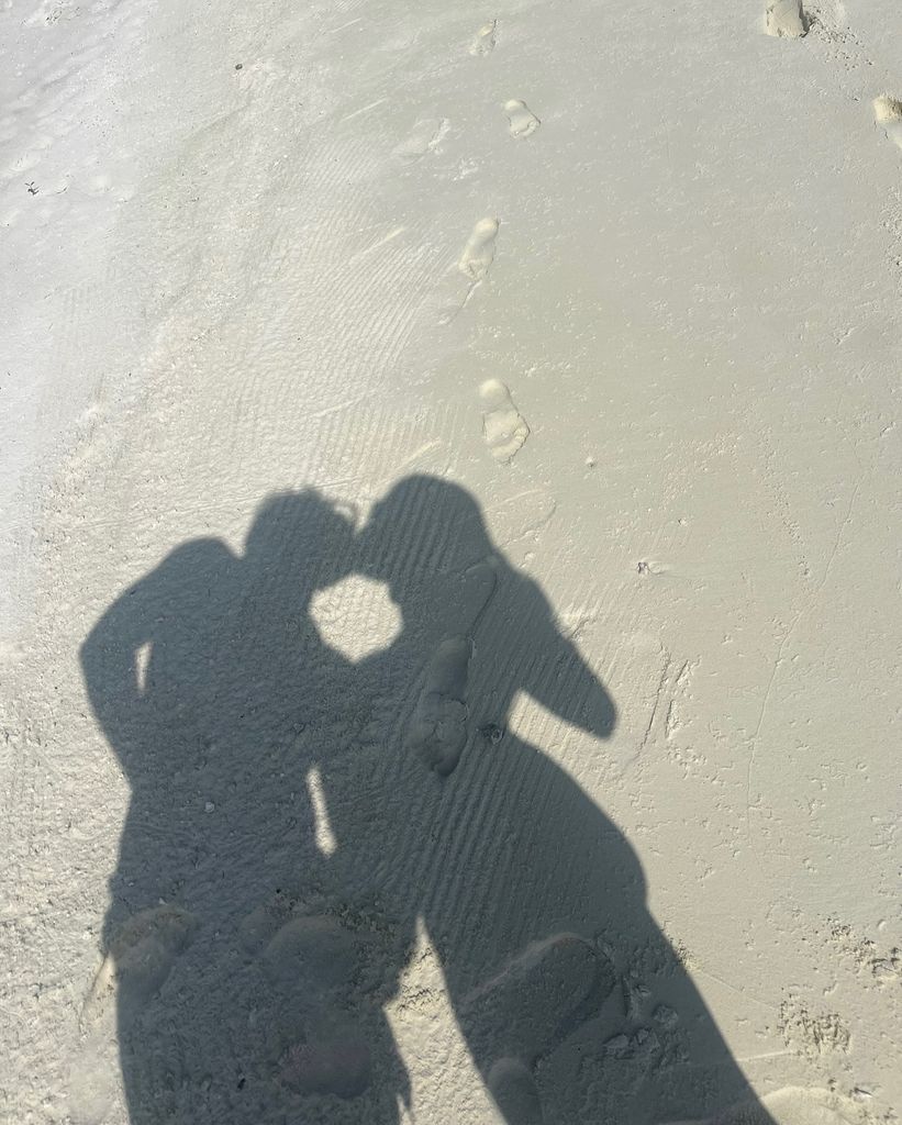 couple kissing on beach