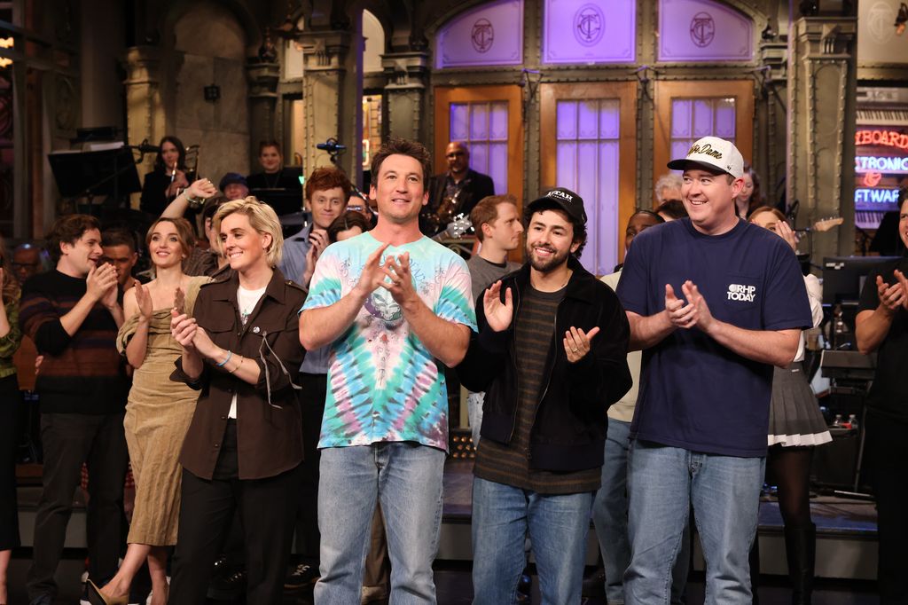 SATURDAY NIGHT LIVE -- Episode 1888 -- Pictured: (l-r) Musical guest Brandi Carlile, host Miles Teller, special guest Ramy Youssef, and special guest Shane Gillis during Goodnights & Credits on Saturday, November 1, 2025
