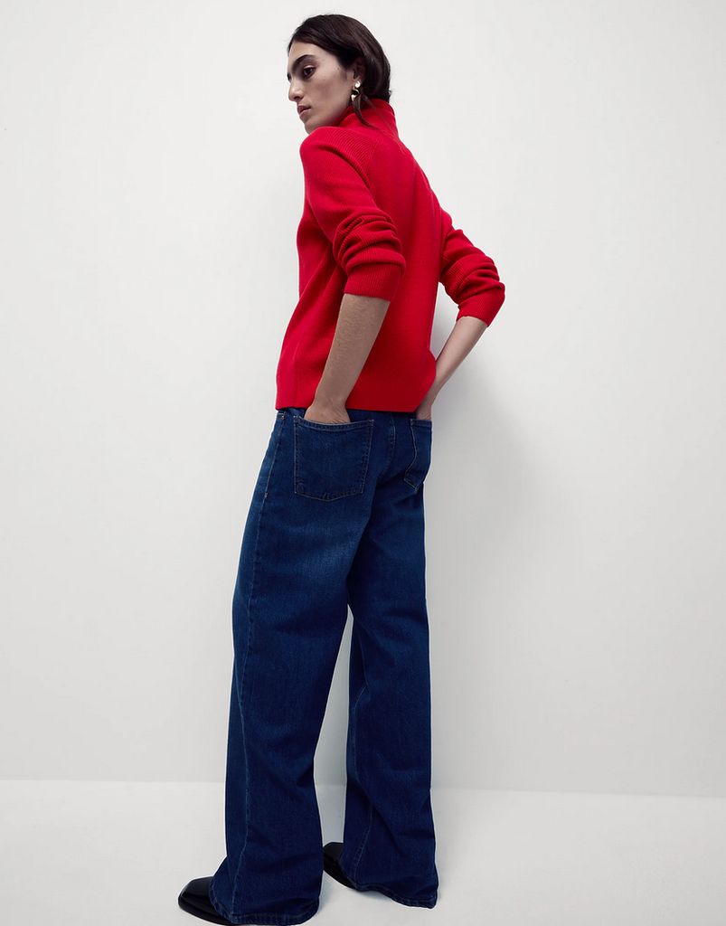 Marks & Spencer styled the sweater with a pair of long indigo blue jeans