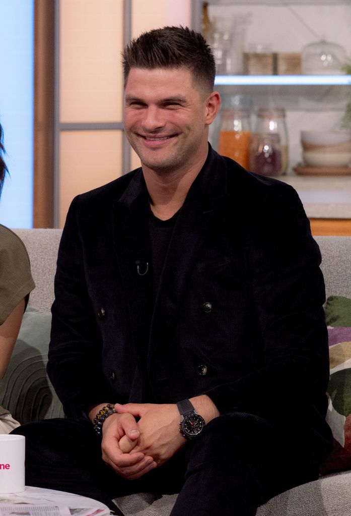 Aljaz Skorjanec in a black outfit