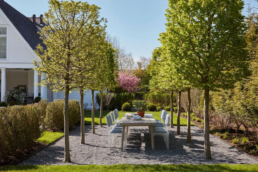 Outdoor dining view of Sylvester Stallone's Hamptons mansion