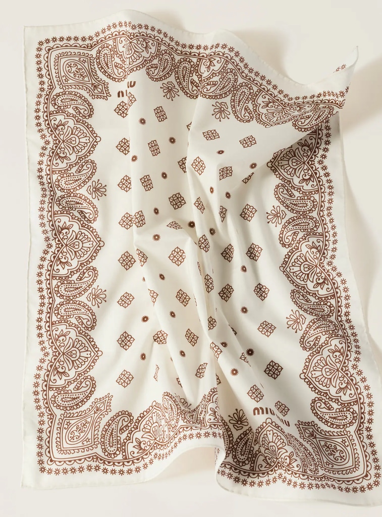A Miu Miu scarf in cream and brown