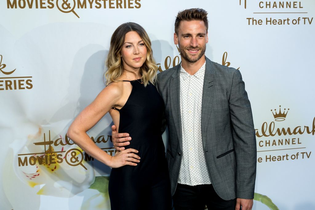 BEVERLY HILLS, CALIFORNIA - JULY 27:  Actor Andrew Walker and Cassandra Troy arrives for the 2017 Summer TCA Tour - Hallmark Channel And Hallmark Movies And Mysteries on July 27, 2017 in Beverly Hills, California.  (Photo by Greg Doherty/WireImage)