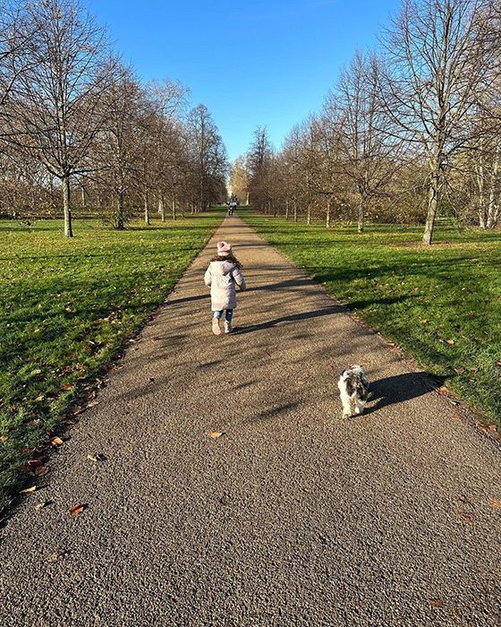 Patricia Lampard running alongside the family dog