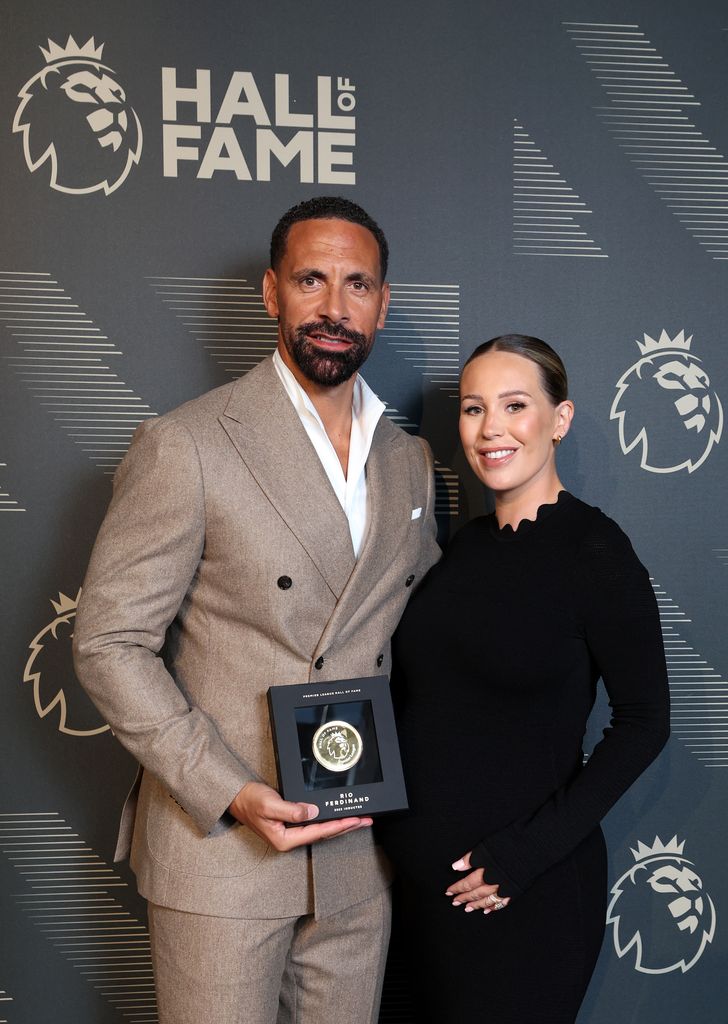 Rio Ferdinand looks smart in a suit as he is joined by his wife Kate