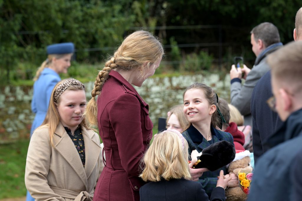 Princess Charlotte smiling at Savannah Phillips