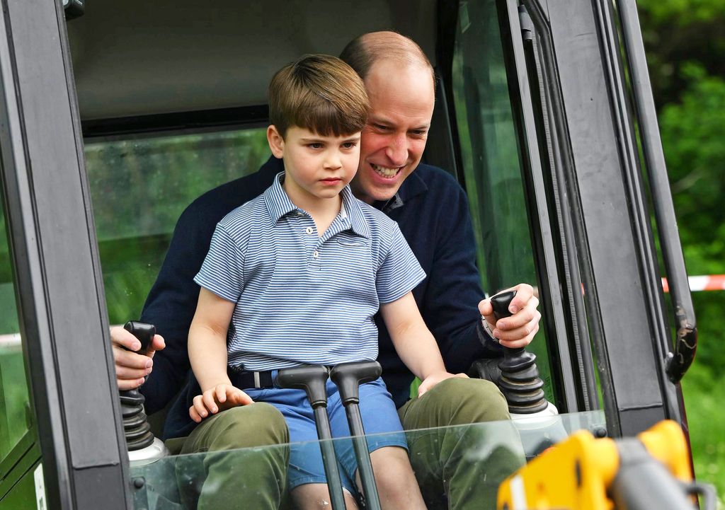 Prince Louis with sitting on Prince William in tractor