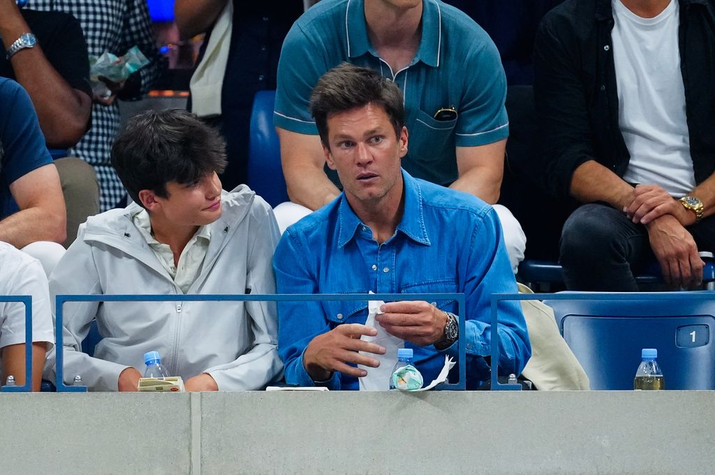     Tom Brady and his son Jake watch a tennis match 