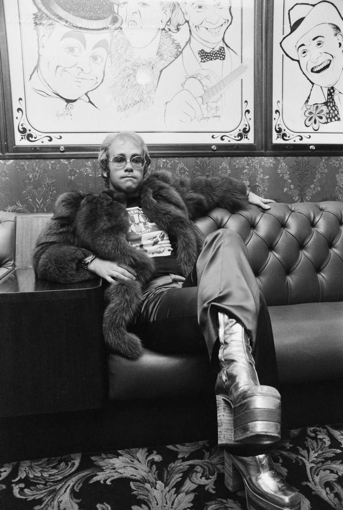 Elton wearing his famous platform boots 