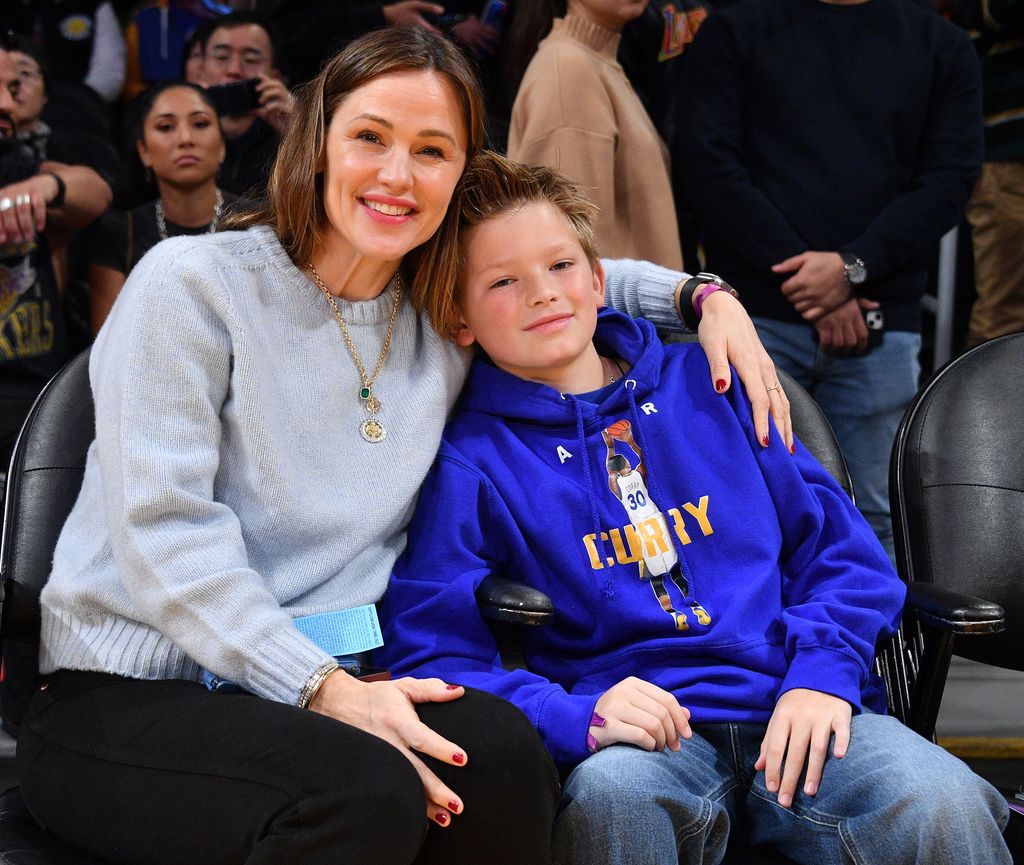 Jennifer Garner and her son Samuel Garner Affleck attend a basketball game between the Los Angeles Lakers and the Golden State Warriors at Crypto.com Arena on March 05, 2023 in Los Angeles, California