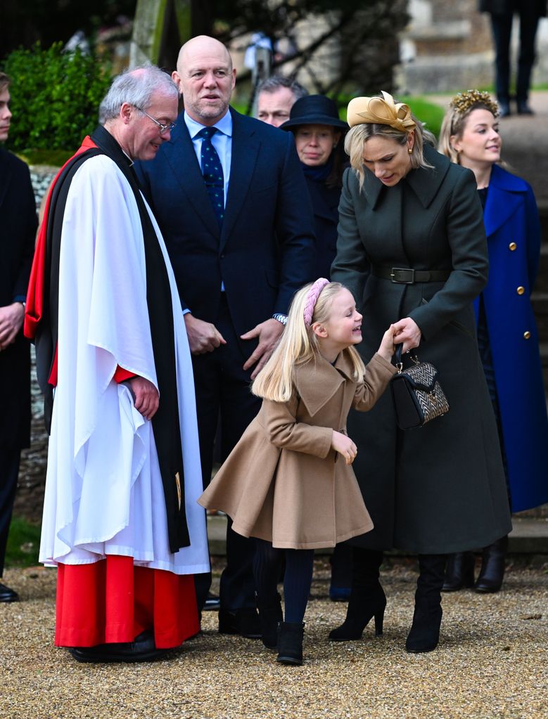 Lena departed St. Mary Magdalene Church alongside her parents, Zara and Mike Tindall