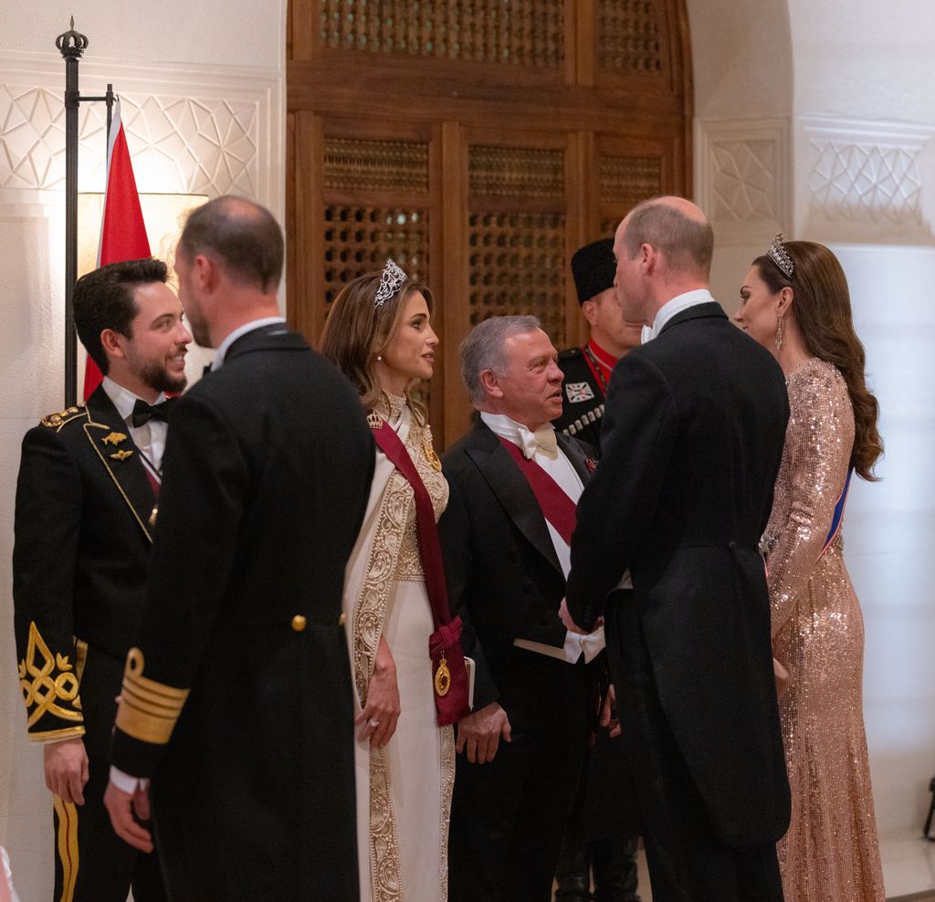 Kate Middleton and Prince William speaking to King Abdullah and Queen Rania ahead of the state banquet dinner
