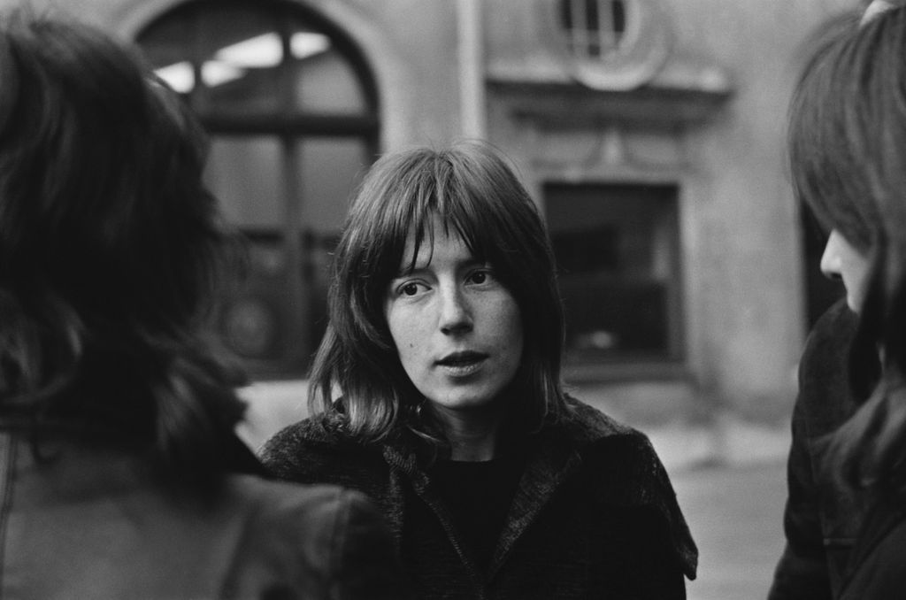 Black-and-white photo of Sally Alexander at a rally