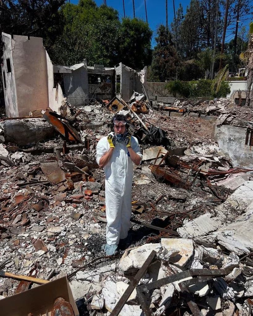 cameron mathison son lucas standing in rubble of family home