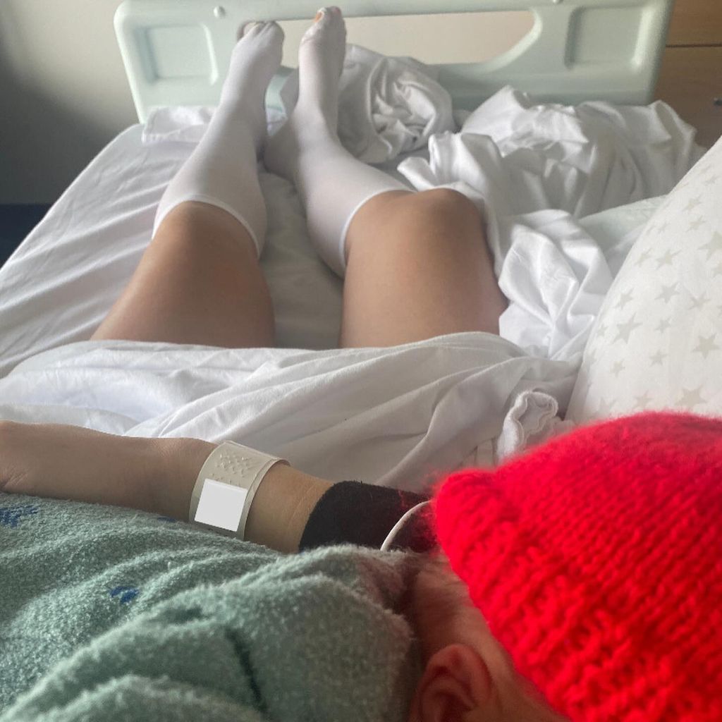 Ellie Taylor holding her newborn baby