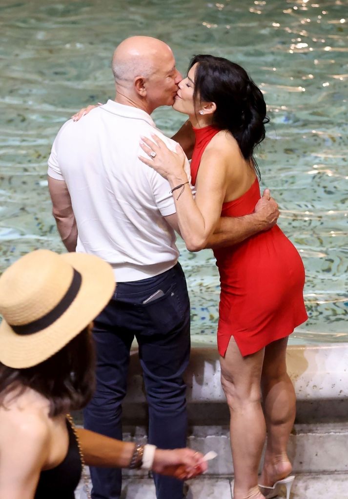 Amazon's multi-billionaire Jeff Bezos and his partner Lauren Sanchez enjoyed a dinner together at the Pierluigi restaurant in Rome. The couple showed their undying love, holding hands at the dinner table and enjoying a fine dinner. Before that, the couple took a romantic stroll through the Eternal City while throwing two coins into the Trevi Fountain and kissing. Legend has it that anyone who throws a coin into the fountain and makes a wish will have their wish granted!! And who knows what wish Bezos has made that may not have been granted yet!!