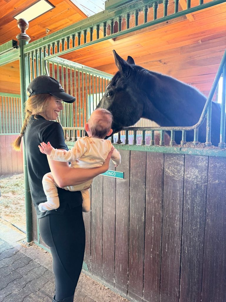 photo of katherine schwarzenegger holding son ford