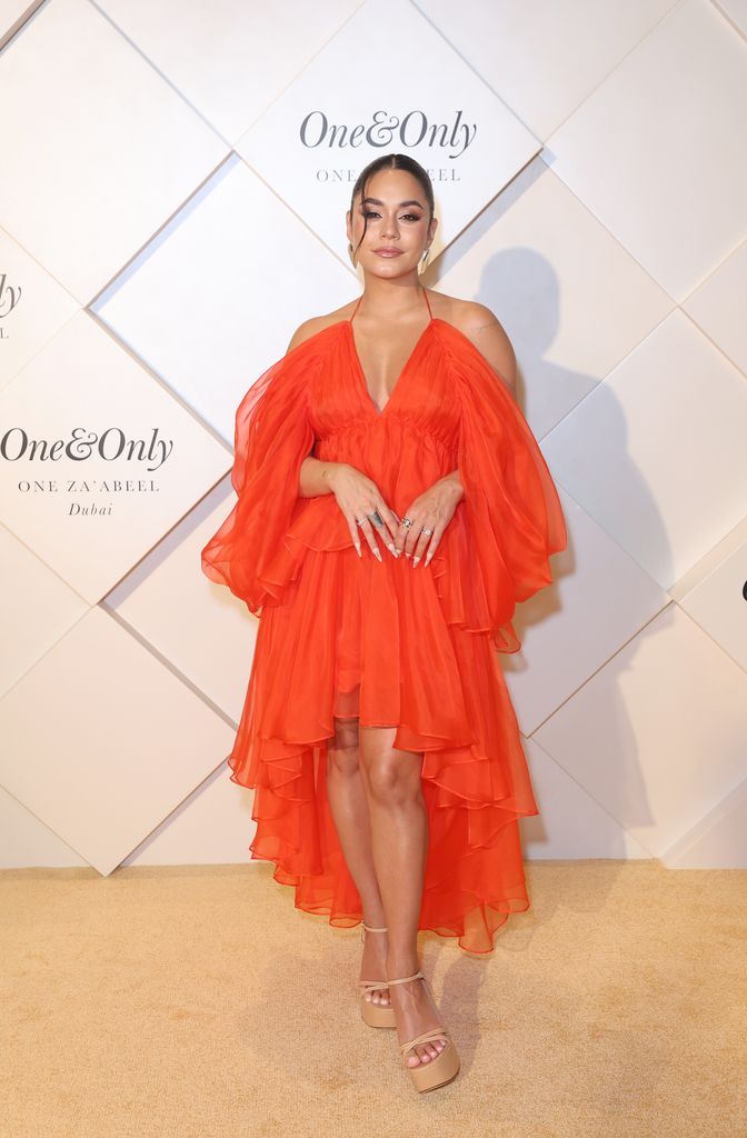 Vanessa Hudgens looked phenomal in a red dress at the launch party