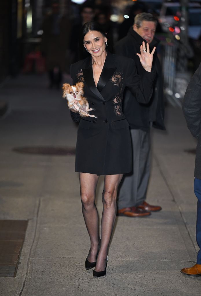 Demi Moore and dog, Pilaf arrive at 'The Late Show With Stephen Colbert' at the Ed Sullivan Theater on January 31, 2024 in New York City. 