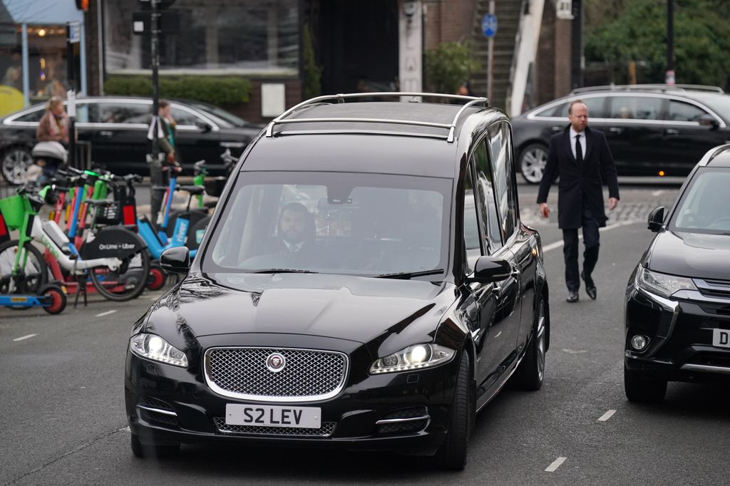 The hearse arrives at the funeral service of Derek Draper at St Mary the Virgin church in Primrose Hill