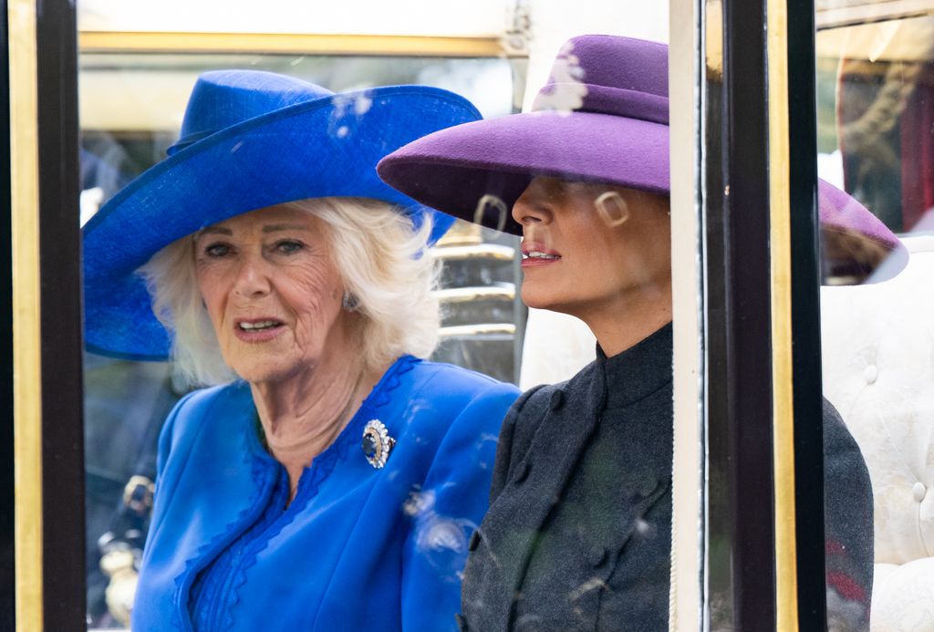 Queen Camilla and First Lady Melania Trump in a carriage during the carriage procession during the State visit by the President of the United States of America at Windsor Castle