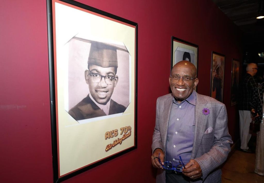 Al Roker with a photograph of himself during his graduation at his early 70th birthday party