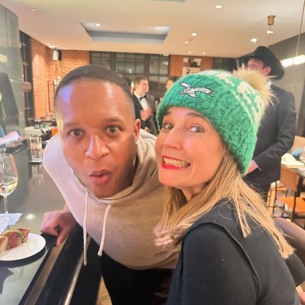 Savannah Guthrie and Craig Melvin watch football in a bar