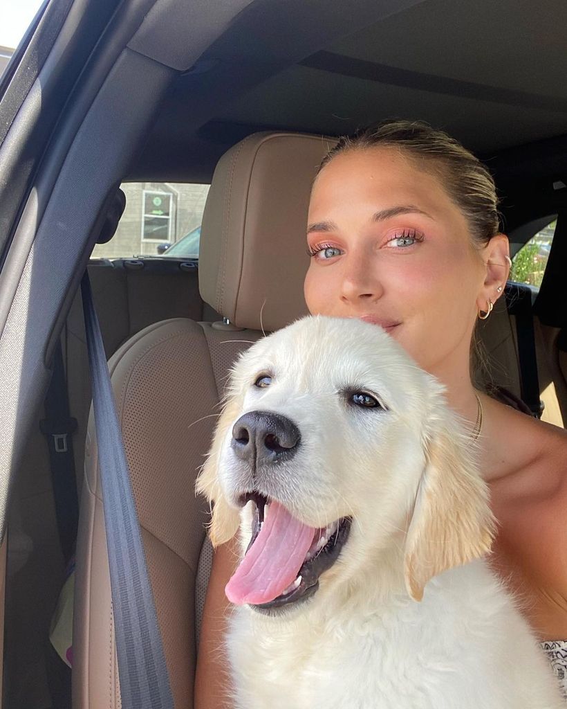Francesca Aiello posing for car selfie with dog 
