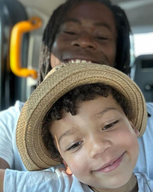 Ade Adepitan and son Bolla in the back of a taxi