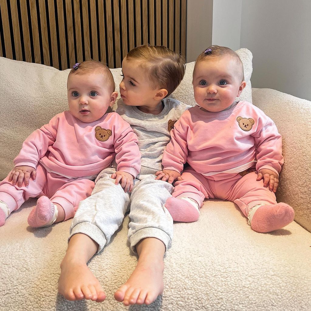 Dani Dyer twin daughters and son on sofa