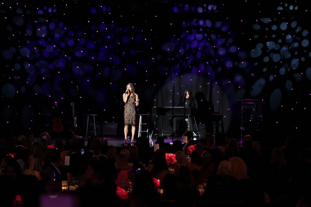 Jami Belushi performs onstage at "An Unforgettable Evening" 2025 Gala