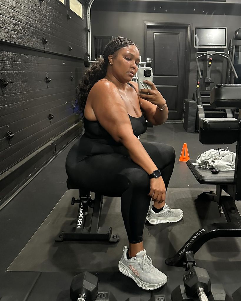 Lizzo doing strength training in the gym