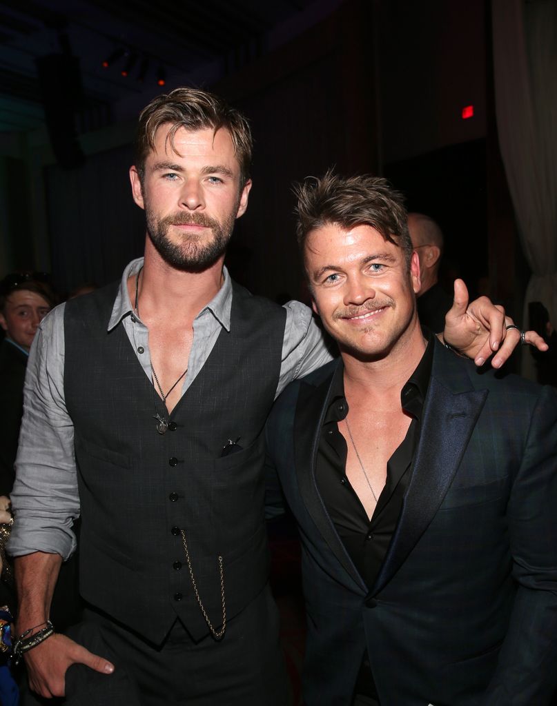 Luke Hemsworth with his hand on Luke Hemsworth's shoulder