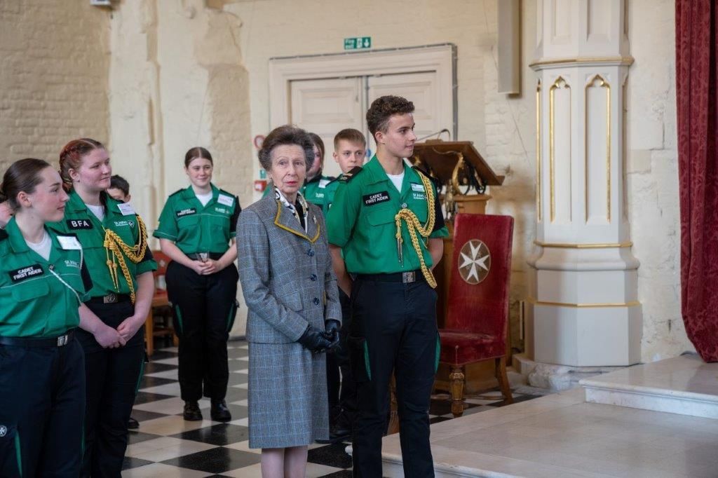 Princess Anne in a tweed jacket and skirt