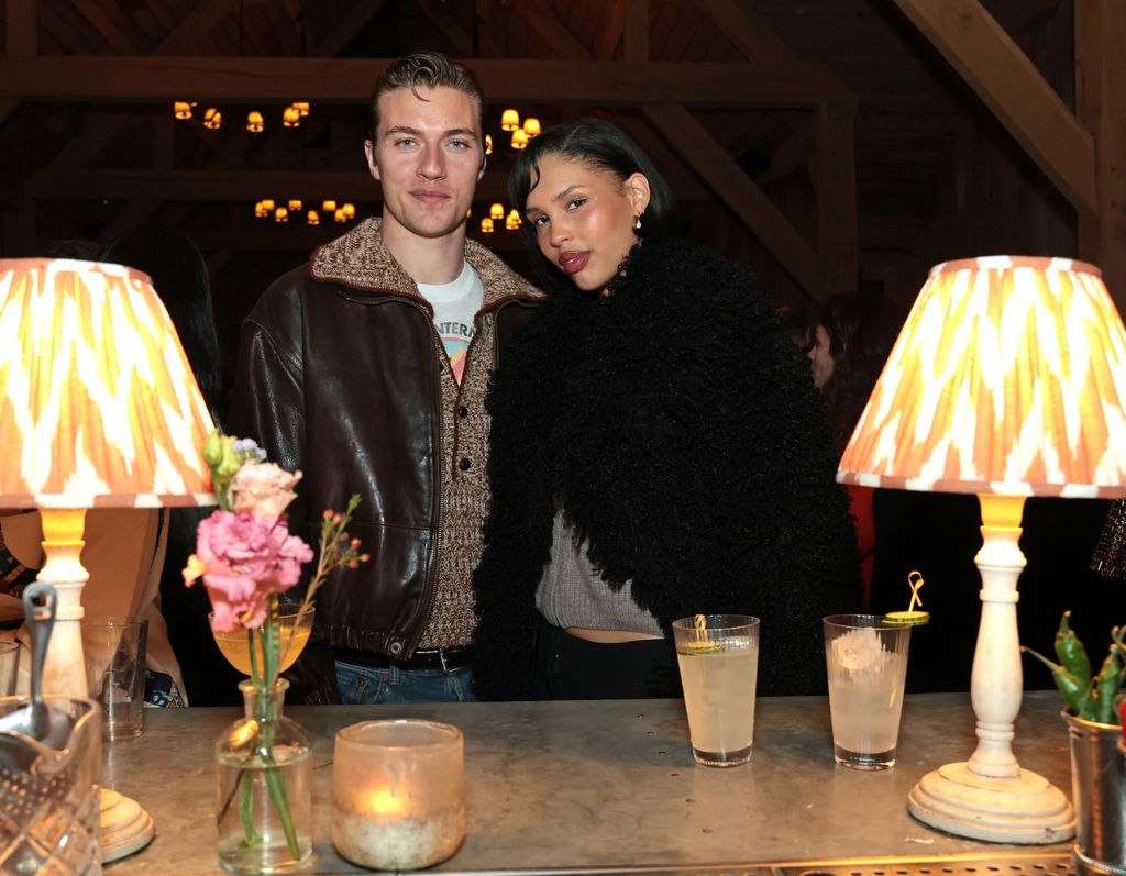 Lucky Blue Smith and Nara Aziza Smith attend the dinner at #BoFVOICES with their arms around each other