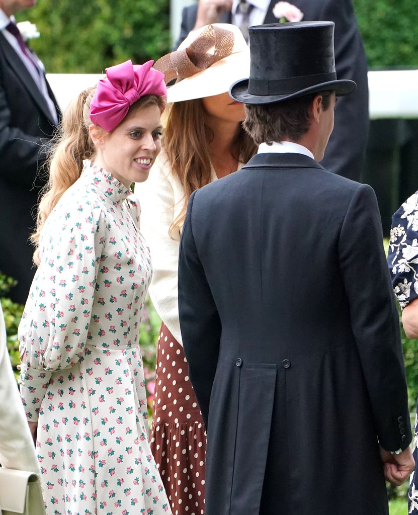 Princess Beatrice in her floral dress next to Edoardo 