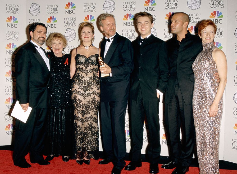 Jon Landau, Gloria Stewart, Kate Winslet, James Cameron, Leonardo DiCaprio, Billy Zane and Frances Fisher pictured at the 1998 Golden Globes