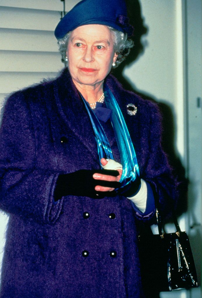 The Queen sports a sling after a horse-related injury