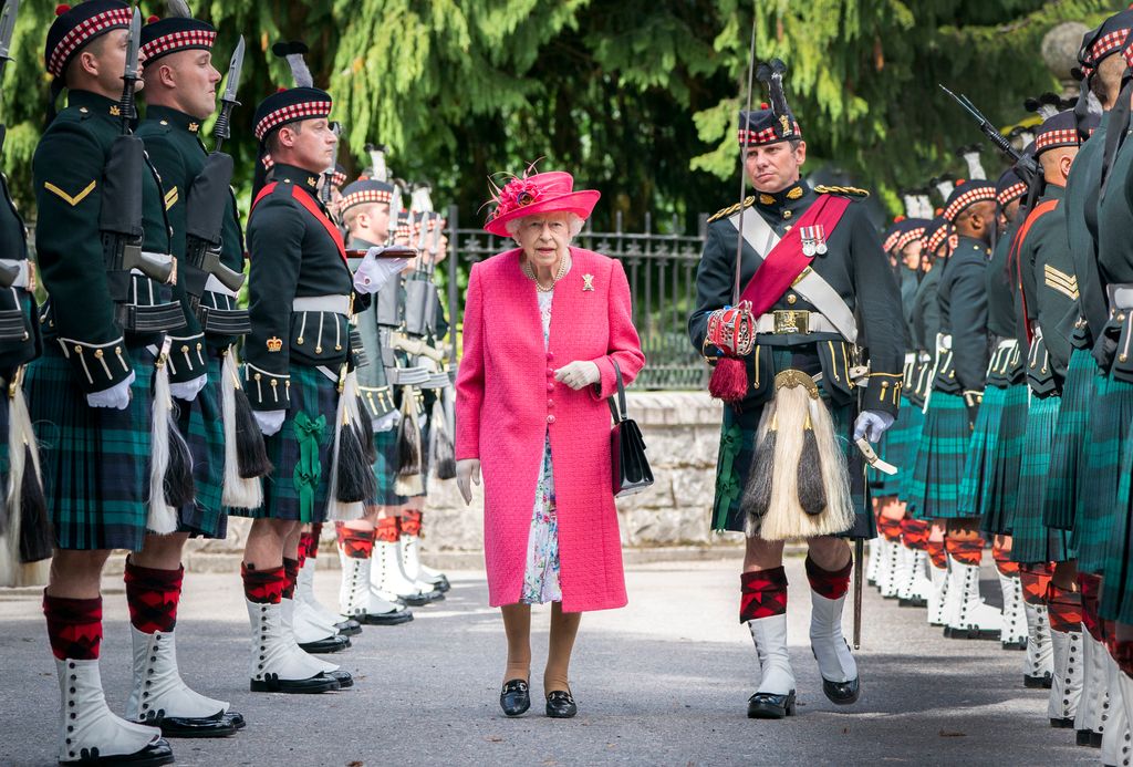 Queen Elizabeth II in pink coat in Scotland 2021
