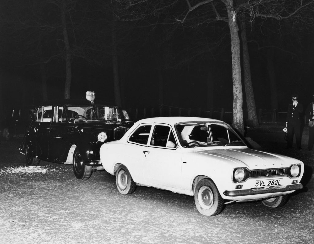 Princess Anne's Rolls-Royce and a white Ford Escort car used by would-be kidnapper Ian Ball to force the royal car to stop