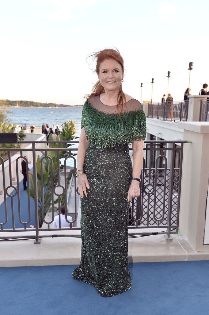 Sarah Ferguson on rooftop in green sparkly dress