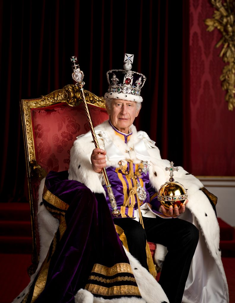 King Charles III is pictured in full regalia in the Throne Room at Buckingham Palac