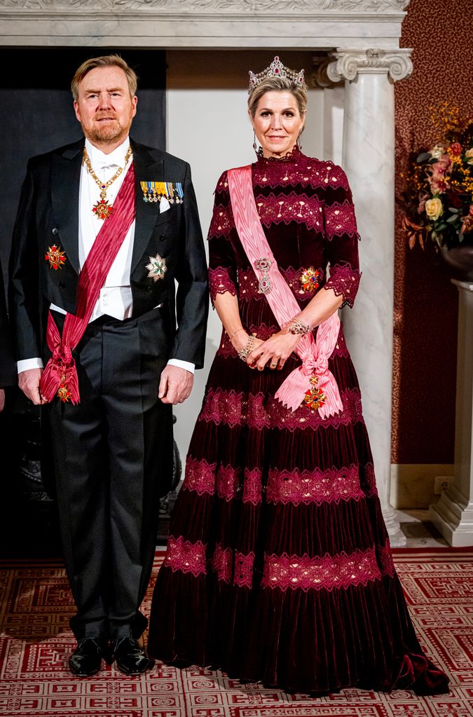 King Willem-Alexander of The Netherlands and Queen Maxima of The Netherlands pose for an official picture at the start of the state banquet in the Royal Palace 