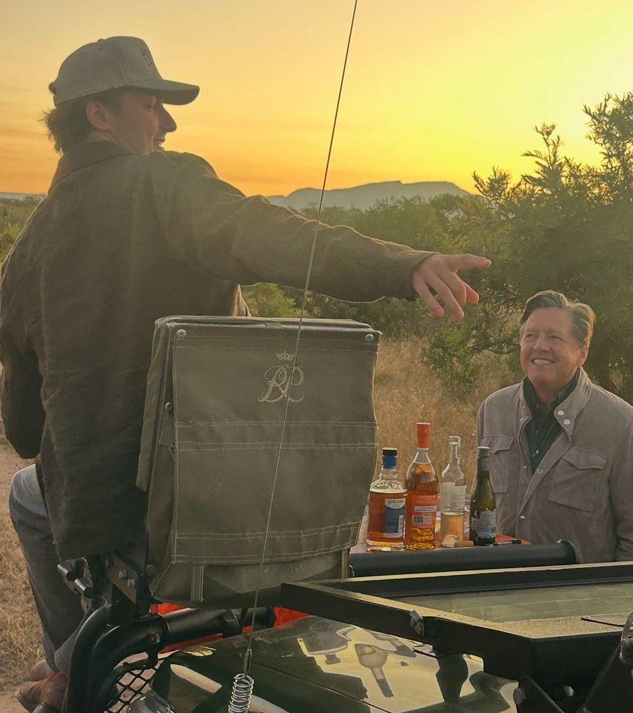 Photo shared by Lara Spencer on instagram May 2025 of her husband Richard McVey and son Duff on a safari in South Africa