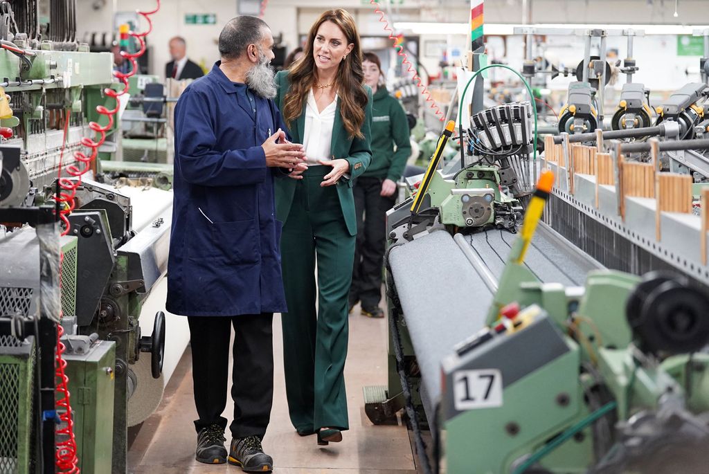 Princess Kate is given a tour of AW Hainsworth