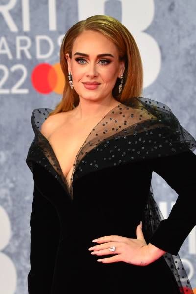 Adele at the 2022 Brit Awards with an engagement ring on her finger